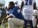 Griffin Middle School assistant coach Antwoine Smith takes a knee during the national anthem before the team’s game against Deerlake. (Photo: Jordan Culver/Democrat)