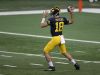 U-M freshman Brandon Peters throws passes during a practice held at Ford Field in Detroit on March 26, 2016.