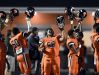 Stratford High School football players raise there helmets before a high school football game against Marshall County on Friday, Sept. 23, 2016, in Nashville, Tenn.