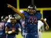 Estero High School's Dj Adams reacts to a fumble recovery early in the first half of a game against Gulf Coast High School in Estero, Fla., on Friday, Sept. 23, 2016.