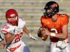 Washington's Jayden Johannsen looks to pass while Rapid City Central's Jordan Ladson chases after during their game on Friday at Howard Wood Field.