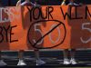 Stratford HIgh School cheerleaders hold a banner before a high school football game against Marshall County High School on Friday, Sept. 23, 2016, in Nashville, Tenn.