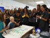 Kristen Perry, center, a physical education teacher and the field hockey coach at John Jay High School, cuts the cake for Liam Craane, 5, center left, who is battling pediatric cancer. Through the Friends of Jaclyn Foundation, Liam was "adopted" by the school's field hockey team.