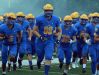 IU commit Britt Beery (88) leads the Carmel Greyhounds onto the field.