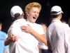 Roberson's Evan Lewis hugs classmate Matt Sharpstene after Wednesday's overtime win over Reynolds in Skyland.
