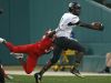 Warren Central Warriors wide receiver David Bell (4) runs in a touchdown despite defense from Pike Red Devils wide receiver Michael Adams (3) during first half action of the Gridiron Classic at Victory Field, Indianapolis, Friday, September 23, 2016.