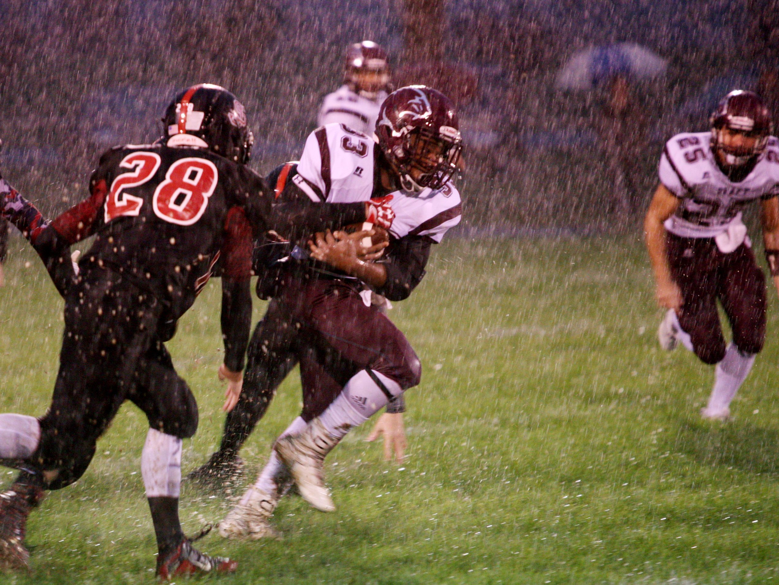 Stuarts Draft's Izzy Johnson runs for one of his two touchdowns during the first half of Friday night's win over Stonewall Jackson.