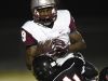 Maplewood's Yusuf Ali, #9, is tackled by Pearl-Cohn's Jamyron Reed, #24, on Friday, September 30, 2016.