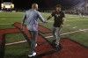 Bishop Gorman (Las Vegas) football coach Kenny Sanchez, left, shakes hands with Cedar Hill, Texas, coach Joey McGuire following Bishop Gorman's 44-14 win last week. (Photo: Tim Heitman/USA TODAY Sports).