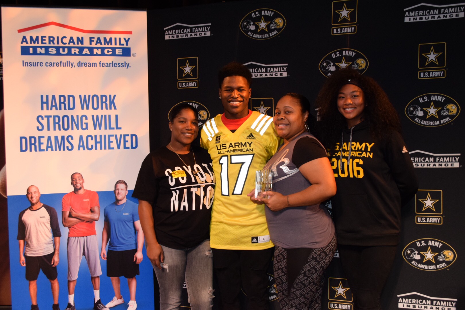 Darnay Holmes gets Army All-American jersey by day, stars on field