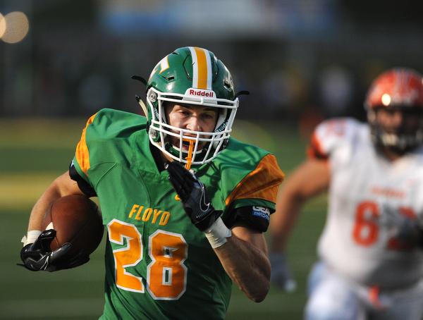 Floyd Central's Dylan McRae (28) runs around the end for a touchdown against Columbus East on Friday at Floyd Central High School. (Photo by David Lee Hartlage, Special to The Courier-Journal) Sept. 23, 2016