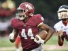MBA running back Ty Chandler (44) races up the field for a touchdown past the Pearl-Cohn defense during the first quarter of their game Friday Aug. 26, 2016, in Nashville, Tenn.