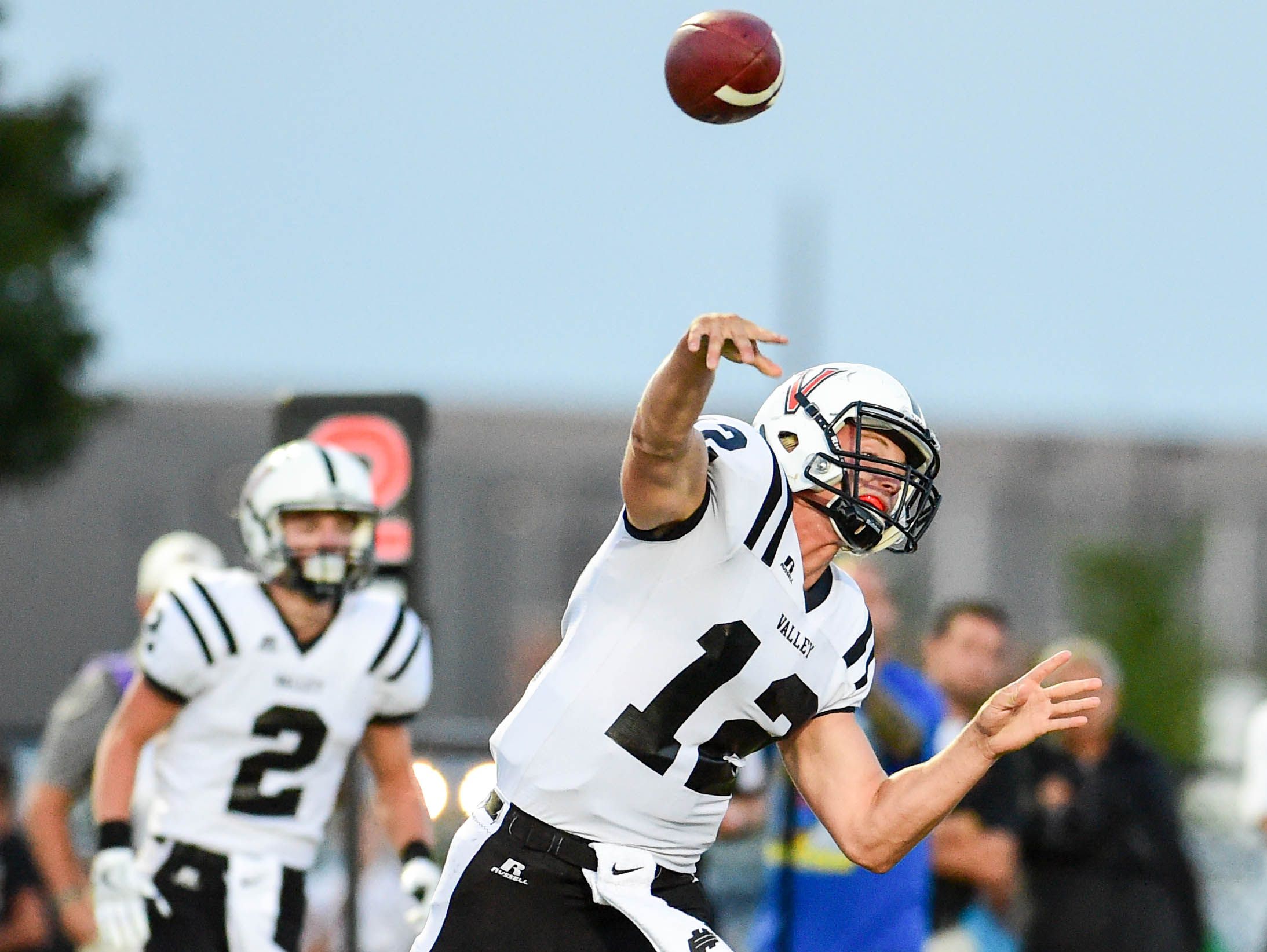 Valley quarterback Rocky Lombardi throw a pass downfield on Sept. 2 against Waukee.