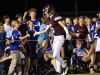 Franklin wide receiver Alex Gaca celebrates with fans after catching a pass for a touchdown during the first half against Brentwood.