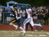 Marquis Carter (20) and Victor's Andrew Russell (9), during the Pittsford running back's 58-yard touchdown run in Week 3.