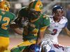 Coachella Valley's Romero Martinez carries the ball into the end zone to score again Indio in the first quarter during the Bell Game on Friday, September 16, 2016 in Thermal.