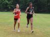 Churchville-Chili's Anna Kostarellis, left, and Rush-Henrietta's Sammy Watson battled in the Wayne Invitational on Sept. 17.