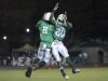 Darrian Felix and Milan Tucker of Fort Myers celebrate the third Green Wave touchdown of the night on Friday, September 30, 2016, against Lehigh Senior High School.