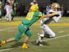 Catholic's Collin Acromite (20) zeros in on Florida High's Kevin Sawyer in first half action.