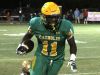 Catholic's Kerrick Teamer returns a punt in the first half.