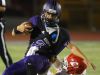 Shadow Hills High School's Seth Morales is sacked by Palm Desert High School's #70 during their game at Indio.