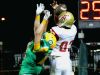 Florida High's Jordan Alexander (83) gets a hand on a pass but couldn't hang on in second half action. Catholic's Collin Acromite (20) defended on the play.