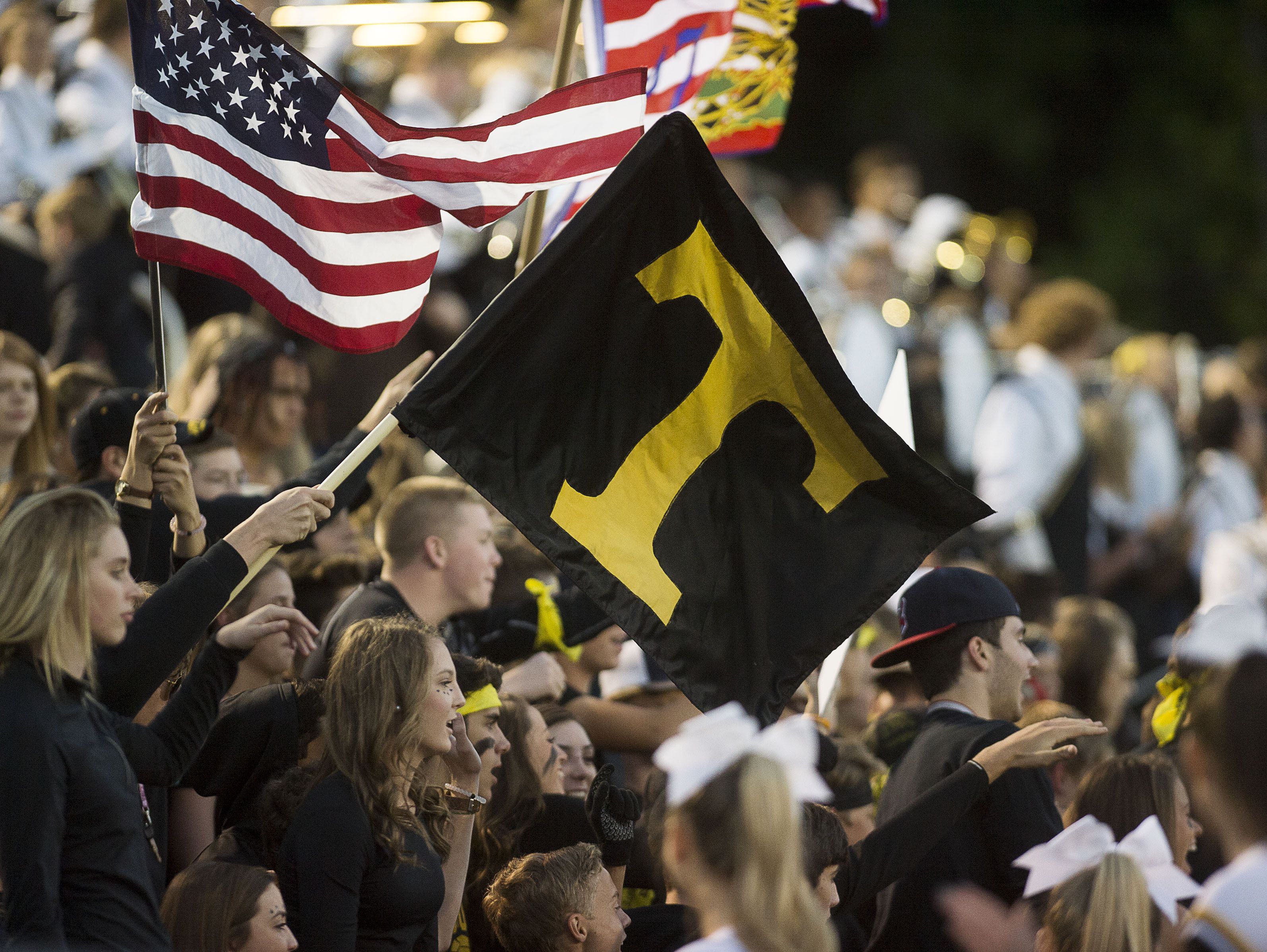 Tuscola fans waive flags during Thursday night's 42-6 win over Brevard in Waynesville.