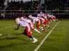 The Canton high school offensive line chases a kickoff during a game against Livonia Churchill on Friday.