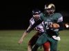 Regis's Eric Gustin runs the ball as the Rams defeat Kennedy 15-7 in a Tri-River Conference game on Friday, Sept. 30, 2016, in Stayton.