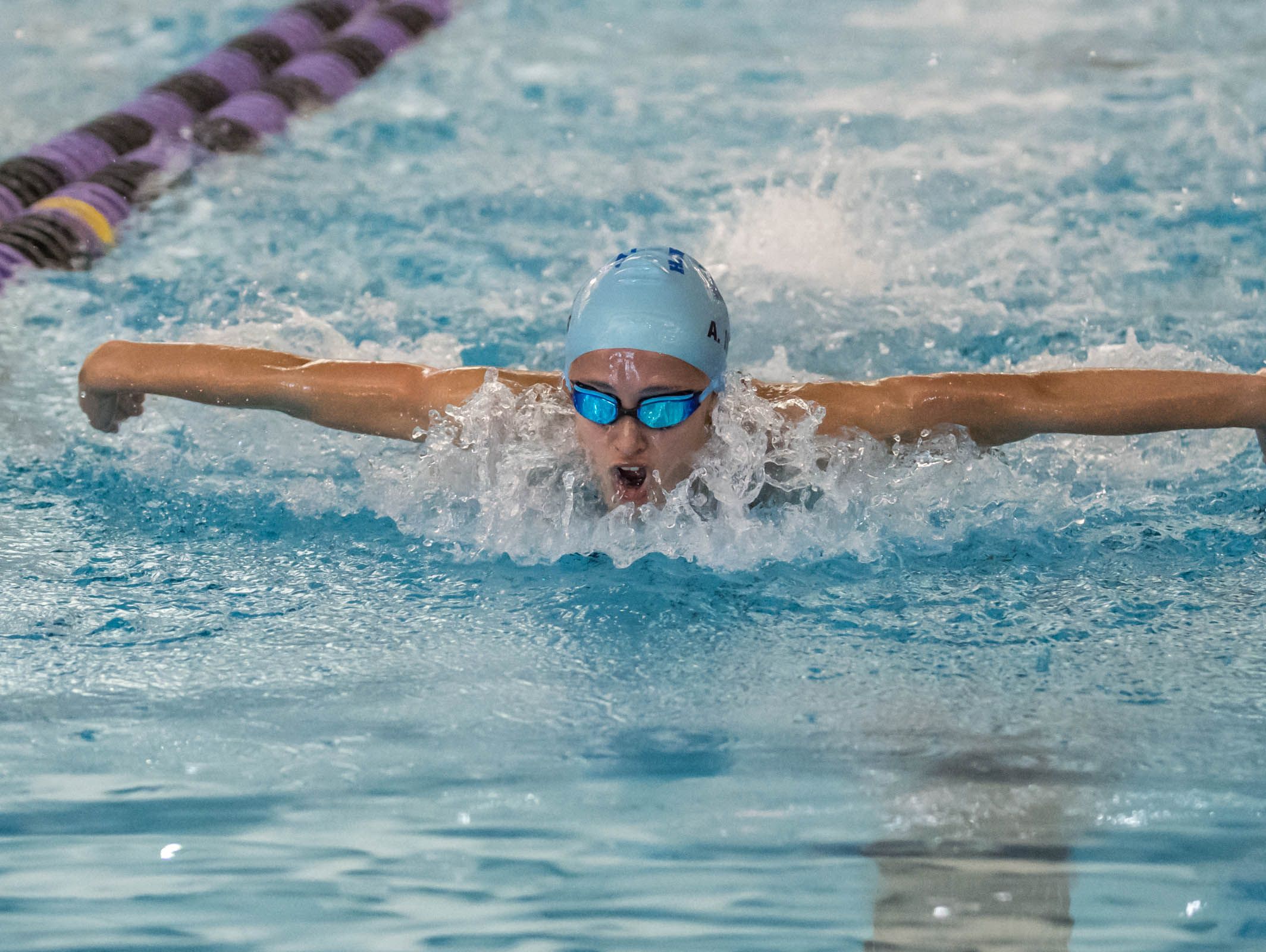 Harper Creek's Alysa Wager competes in the 100 Yard Butterfly during the 2016 All-City Swim Meet held at Lakeview on Saturday.