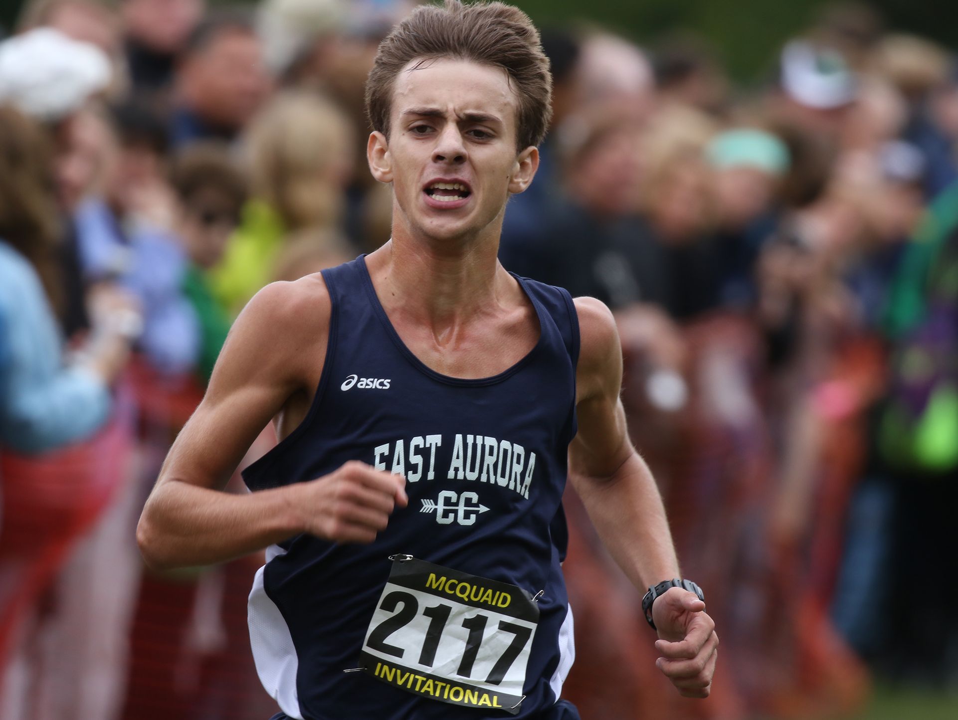 Ian Russ of East Aurora comes in first with a time of 14:46.5 in the Boys Seeded Varsity AA medium schools division.