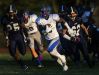 Woodbridge's Antwain Holden returns the opening kickoff for a touchdown in the first quarter of Woodbridge's 32-0 win over Lake Forest at Lake Forest High School in Felton on Monday evening.