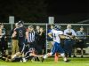 David Locher ,right, of DeWitt outruns Joey Kratzer ,bottom, of St. Johns for a touchdown midway through the 3rd quarter of their game Friday October 7, 2016 in St. Johns. The 1st down run from scrimmage put DeWitt up 18-7. KEVIN W. FOWLER PHOTO