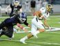 Noblesville's Nick Rusie eludes a Brownsburg defender during the Millers' 22-21 win Friday night.