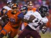 Navarre High School's, Michael Carter, (No. 7) gives the Escambia High School defense the slip with a run up the middle during Friday night's game against the Gators.