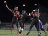 Wilson quarterback James Cotton throws a long pass at Rhinos Stadium on Friday, Oct. 7, 2016.