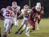 Quarterback Jack Henry (16) keeps the ball during the Pace vs Tate football game at Tate High School on Friday, October 7, 2016.