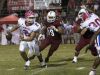 Te'Marques Dunnigan (9) closes in on Quarterback Damean Bivins (2) during the Pace vs Tate football game at Tate High School on Friday, October 7, 2016.