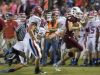 Quarterback Jack Henry (16) escapes the Pace defense for a big run during the Pace vs Tate football game at Tate High School on Friday, October 7, 2016.