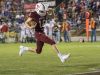 Quarterback Jack Henry (16) high steps into the endzone to go up 21 - 0 during the Pace vs Tate football game at Tate High School on Friday, October 7, 2016.