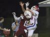 Reid Halfacre (15) and Cameron Bozeman (83) leap but can't hang on the ball during the Pace vs Tate football game at Tate High School on Friday, October 7, 2016.