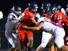 Daniel Davila fights through a couple of tackles for tough yardage