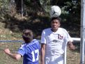 Valhalla's Ethan Bartlett heads the ball away from Goshen's Liam Degan during the Section 1 vs. Section 9 boys soccer challenge at Mamaroneck High School Oct. 10, 2016. Goshen defeated Valhalla in overtime 1-0.