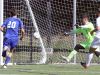 Goshen's Liam Kelly scores the winning goal on Valhalla goalkeeper Lorenzo Luciano in overtime during the Section 1 vs. Section 9 boys soccer challenge at Mamaroneck High School Oct. 10, 2016. Goshen defeated Valhalla 1-0.