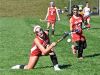 Fox Lane's Olivia Dey flips ball off corner. The flip was ruled dangerous and the play halted..