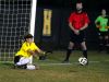 Hendersonville senior goalkeeper Makensie Cotter makes a save during the penalty-kick shootout against Station Camp.