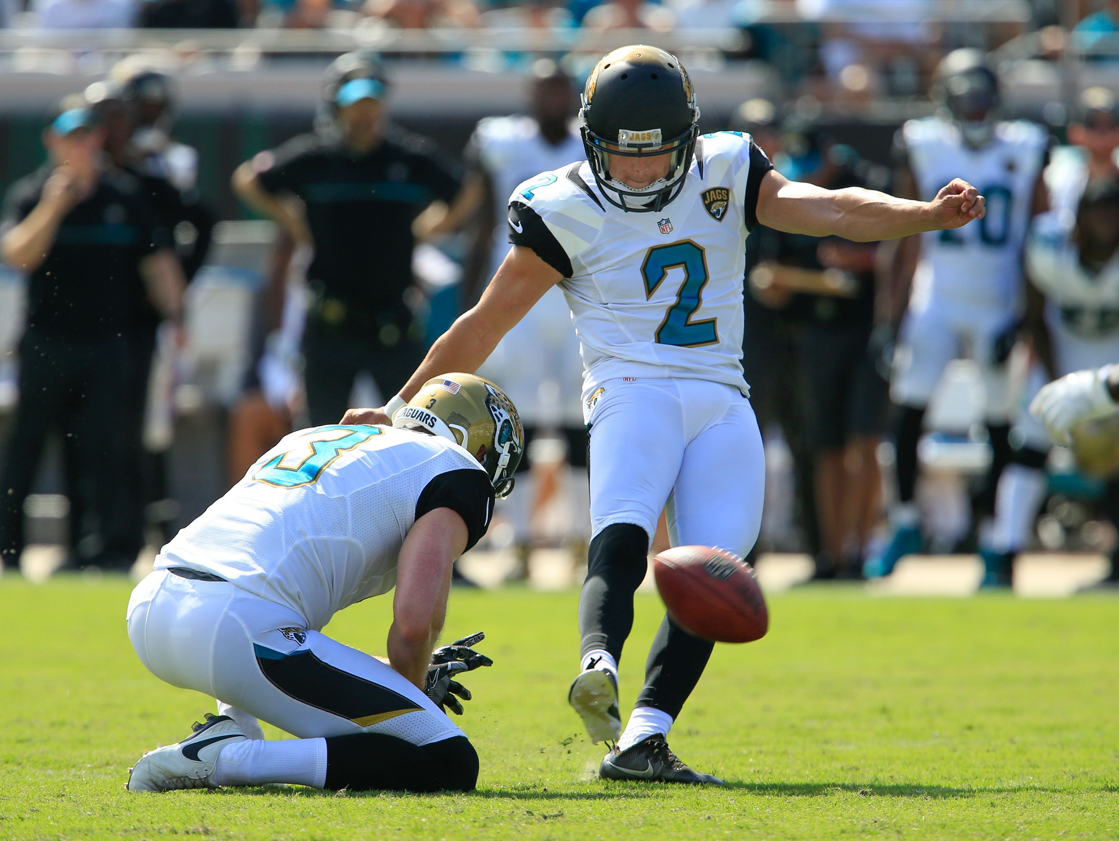 Jacksonville Jaguars kicker Jason Myers kicks a field goal from the hold of Jacksonville Jaguars punter Brad Nortman during the second half of a football game at EverBank Field on Sept. 25. The Baltimore Ravens won 19-17.