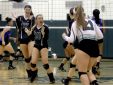 Yorktown setter Macey Drezek (10) and the Huskers cheer after winning a point during a varsity volleyball match against Hendrick Hudson at Yorktown High School Oct. 13, 2016.