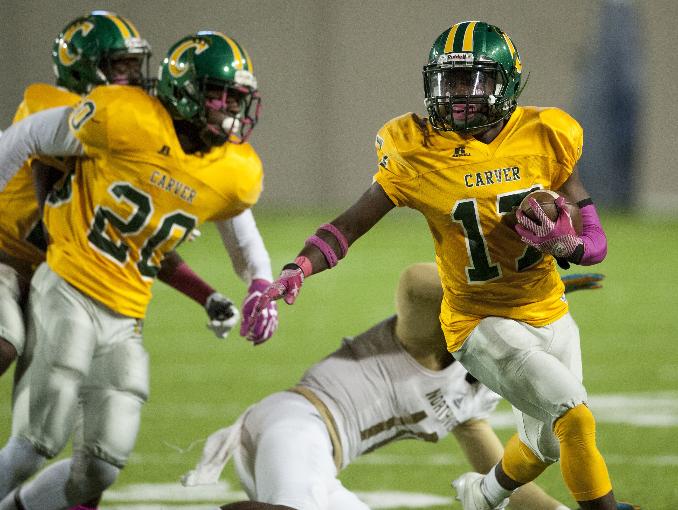 Carver's De'Marquis Russell returns an interception against Northview at Cramton Bowl in Montgomery, Ala., on Thursday October 13, 2016.