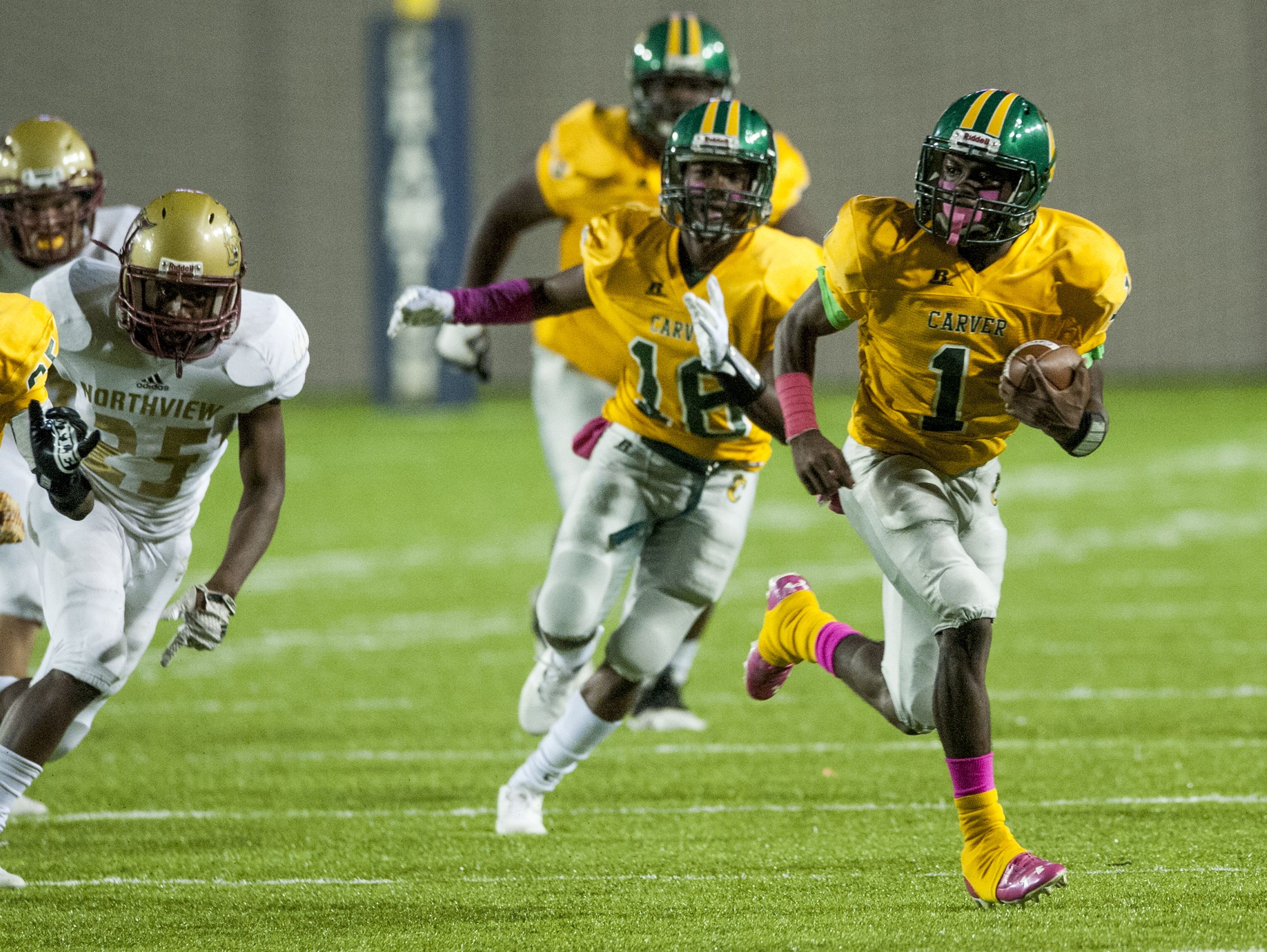 Carver's Ronald Harris (1) breaks free for a long first half touchdown run against Northview at Cramton Bowl in Montgomery, Ala., on Thursday October 13, 2016.